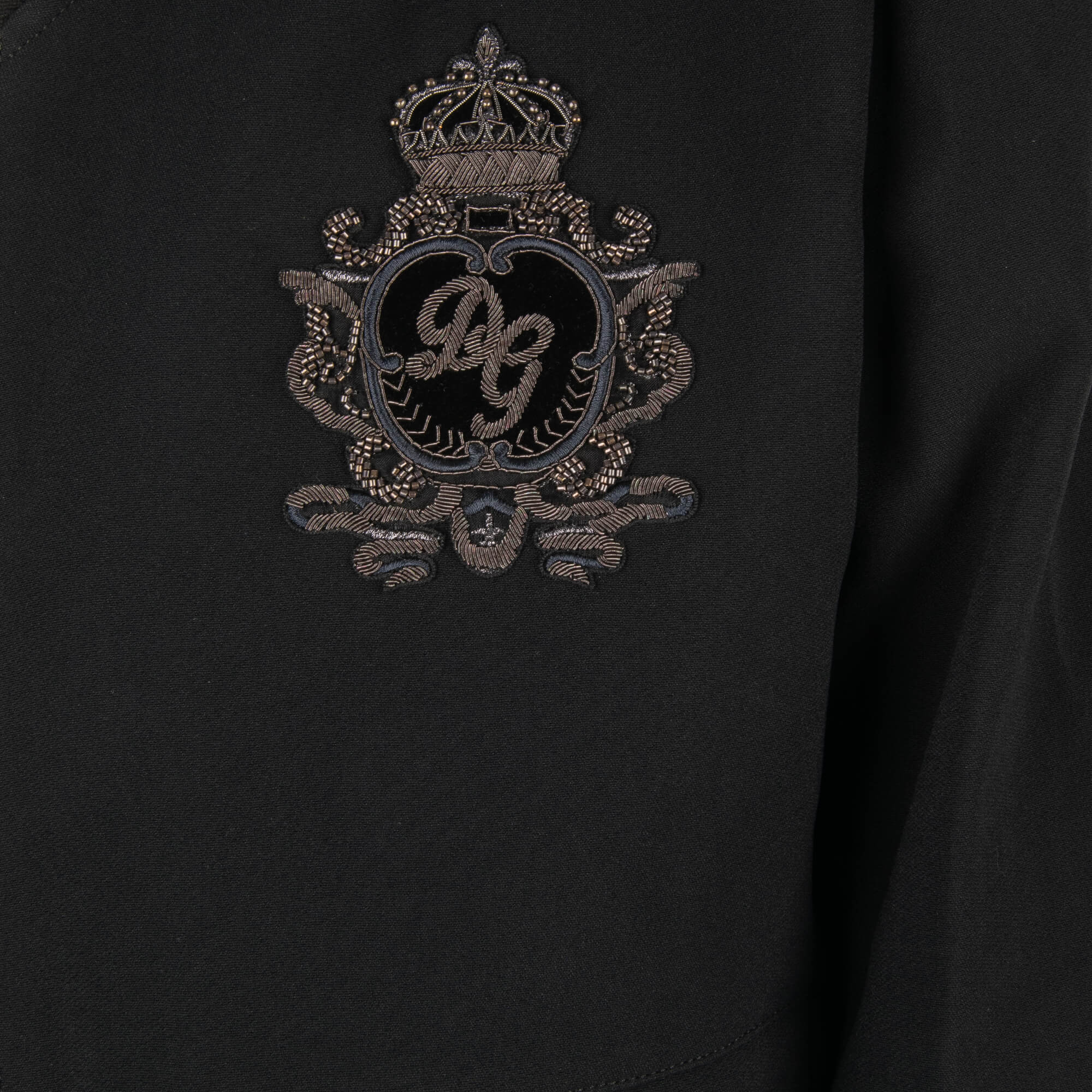 Gesteppte Jacke aus Wolle mit besticktem DG Logo und Krone und Taschen mit Reißverschluss von DOLCE & GABBANA
