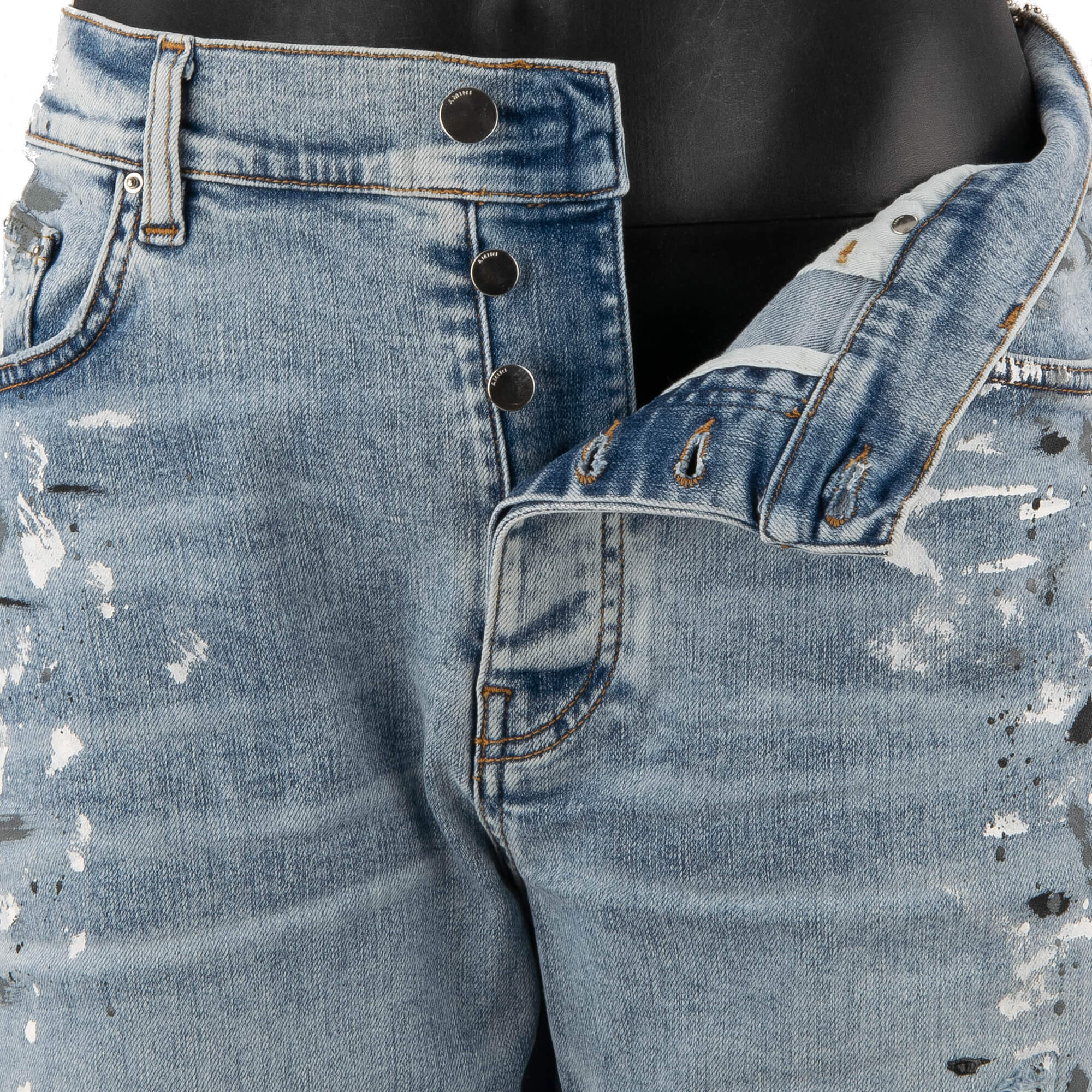 5-pockets Skinny Distressed Stretch Painter MX1 Jeans in Vintage Blue with unique color splashes and elastic inserts by AMIRI