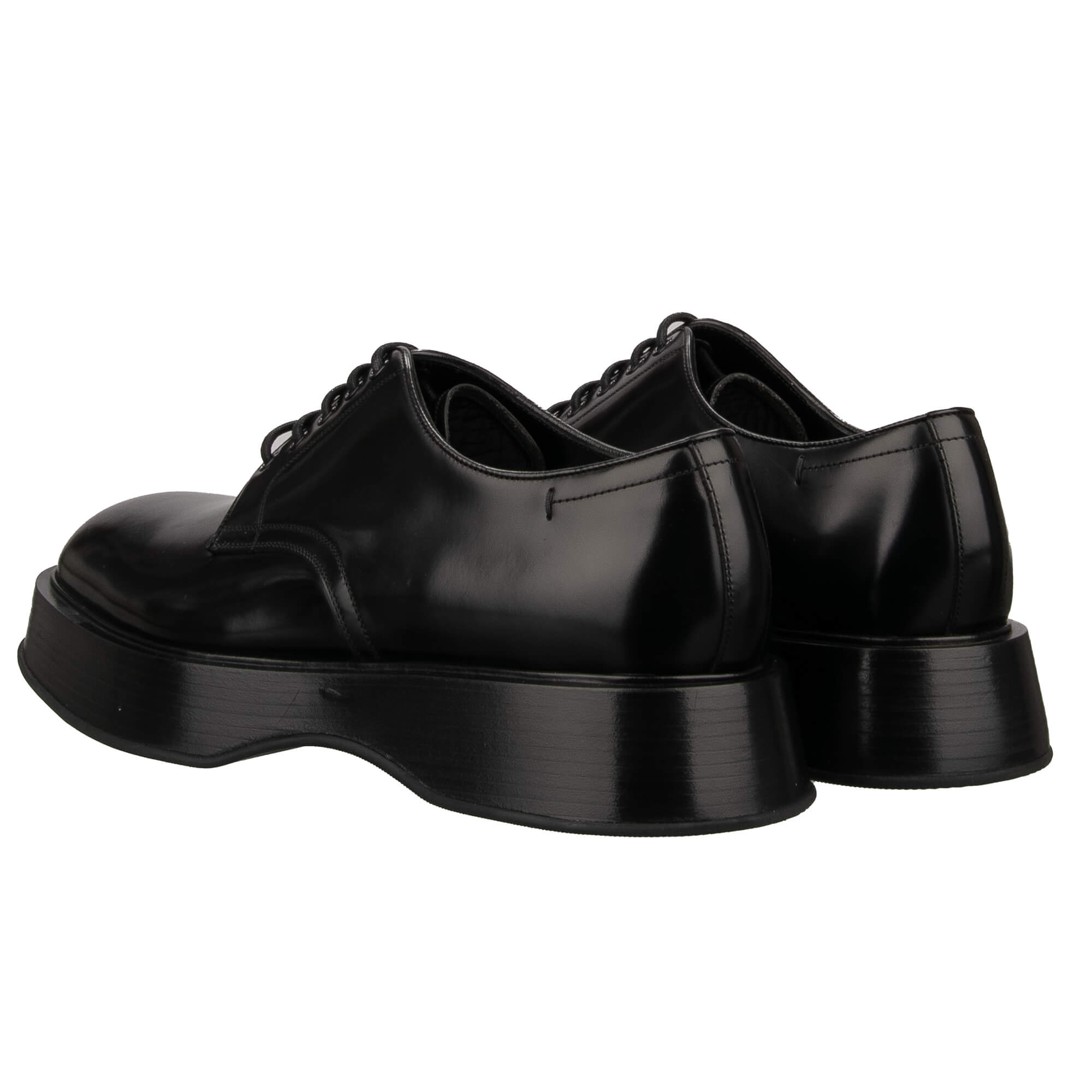 Leather plateau shoes MICHELANGELO with metal DG logo plate in black by DOLCE & GABBANA 