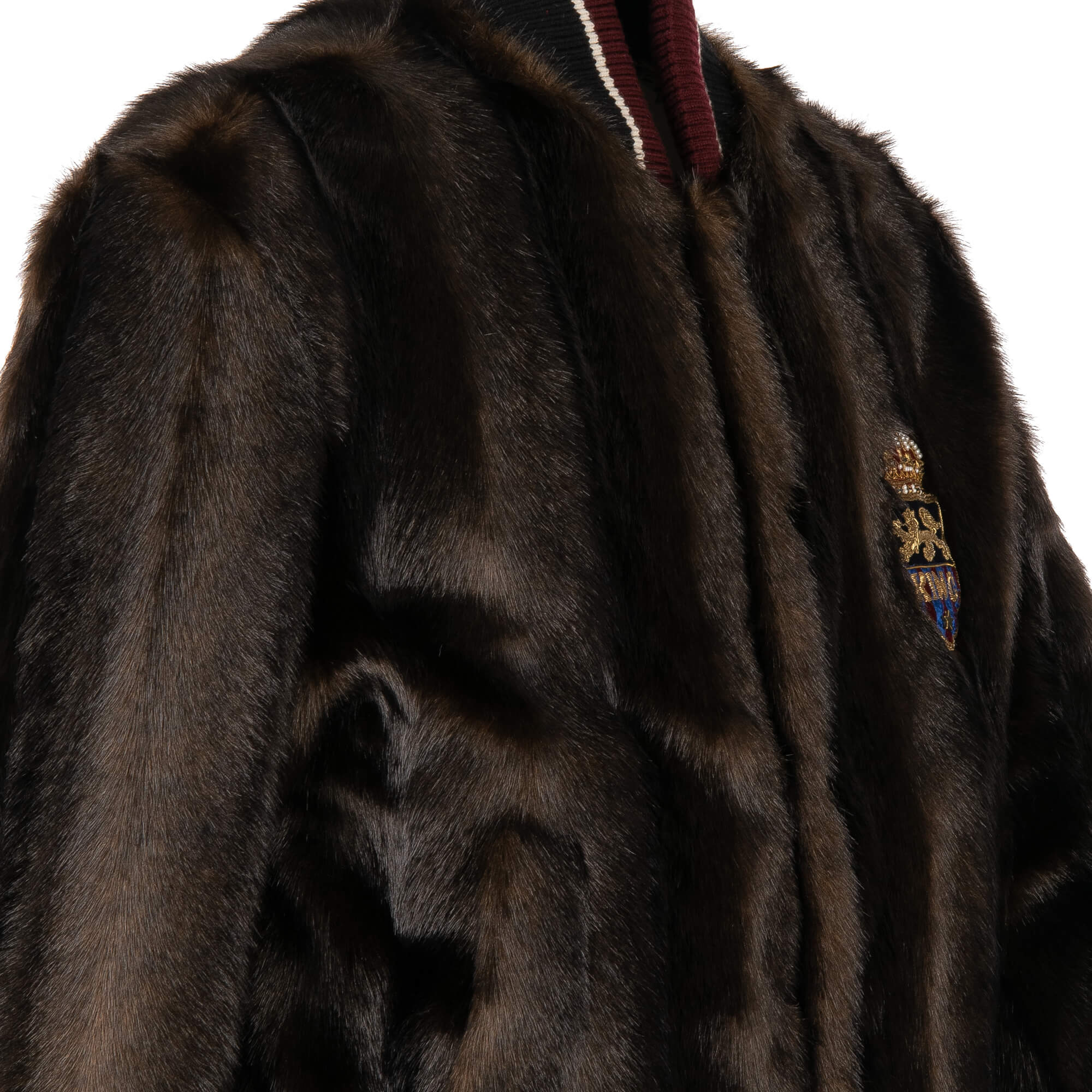 Stuffed Fake Fur bomber jacket with King and Crown embroidery in front and knit details by DOLCE & GABBANA