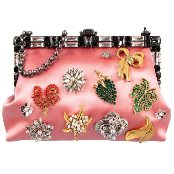 With various crystals and pearls brooches applications embellished silk clutch / evening bag VANDA by DOLCE & GABBANA