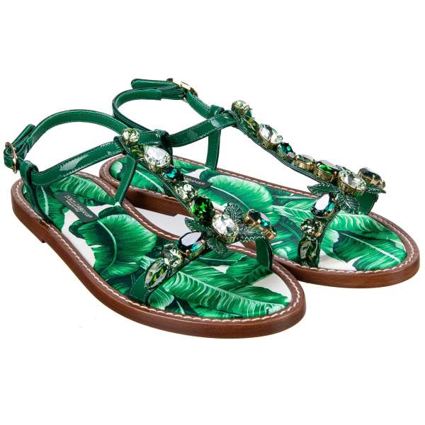 Flat patent leather strappy sandals PORTOFINO with crystals, hand painted leaves applications and banana leaves printed satin insole in green by DOLCE & GABBANA