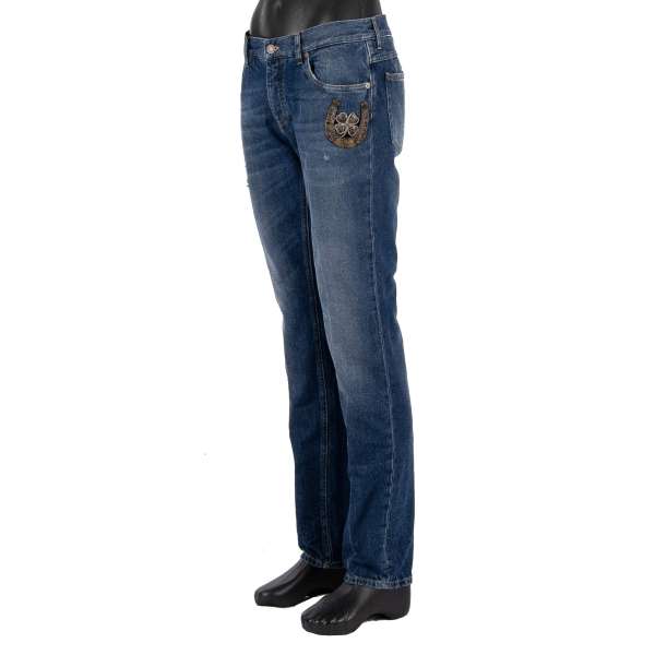 Distressed Straight cut 5-pockets Jeans with goldwork pearl shamrock and horseshoe embroidery in blue by DOLCE & GABBANA