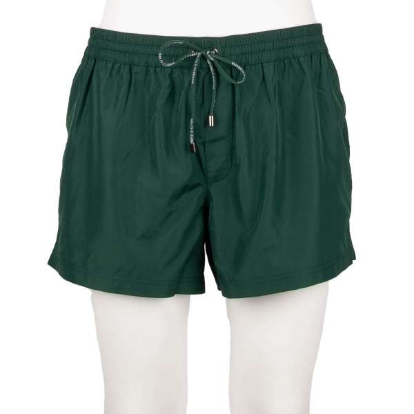 Swim shorts / Board shorts with pockets, built-in-brief and logo by DOLCE & GABBANA Beachwear