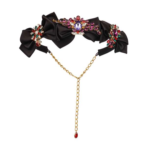 Adjustable Belt embelished with silk ribbon brooches covered with crystals and gold chain with red pendant on the back in black by DOLCE & GABBANA 