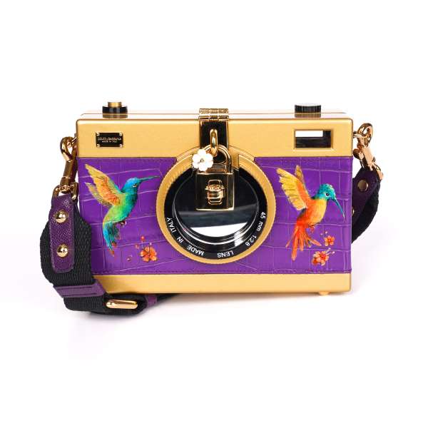 Crossbody clutch bag DOLCE CAMERA BOX Medium made of plastic in gold and crocodile leather with hummingbird motiv in purple by DOLCE & GABBANA