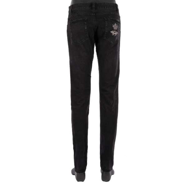 Distressed Straight cut 5-pockets Jeans with goldwork pearl crown and bee embroidery in black by DOLCE & GABBANA