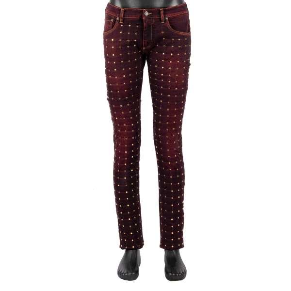 Distressed slim fit 5-pockets Jeans with studs padded front side in red by DOLCE & GABBANA