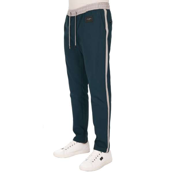 Cotton Joggings Pants with DG leather logo plate, contrast stripes, elastic waist and zipped pockets by DOLCE & GABBANA