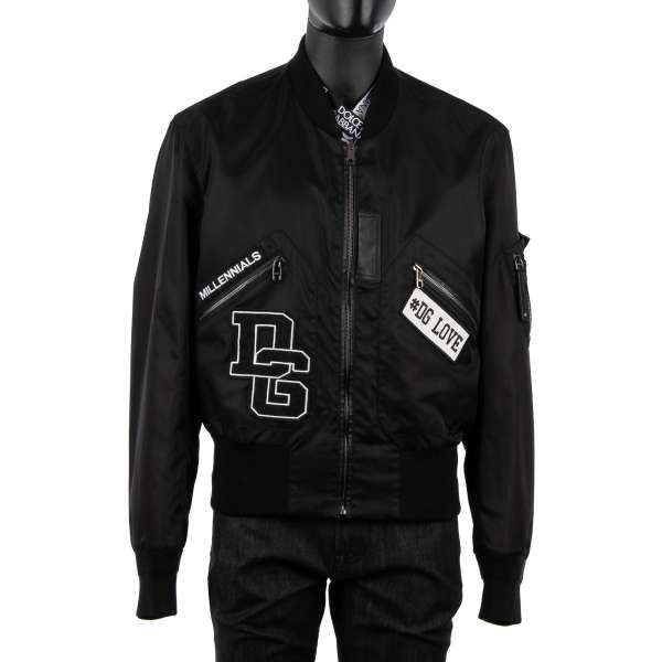 Weit geschnittene Wendejacke / Bomber Jacke mit Logo, DG Millennials, DG King, DG Love, DG Life Applikationen und Strick-Kragen in Schwarz und Blau von DOLCE & GABBANA Black Label