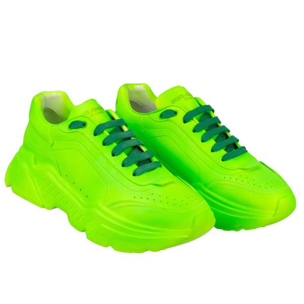 Spray Paint covered Low-Top Sneaker DAYMASTER with massive sole and DG logo on the back in neon green by DOLCE & GABBANA