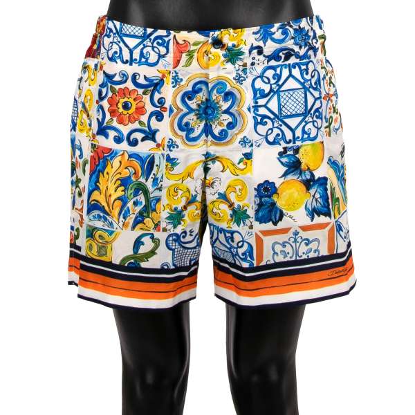 Majolica and logo printed Swim shorts / Board shorts with pockets, expandable buckles, logo and built-in-brief by DOLCE & GABBANA Beachwear