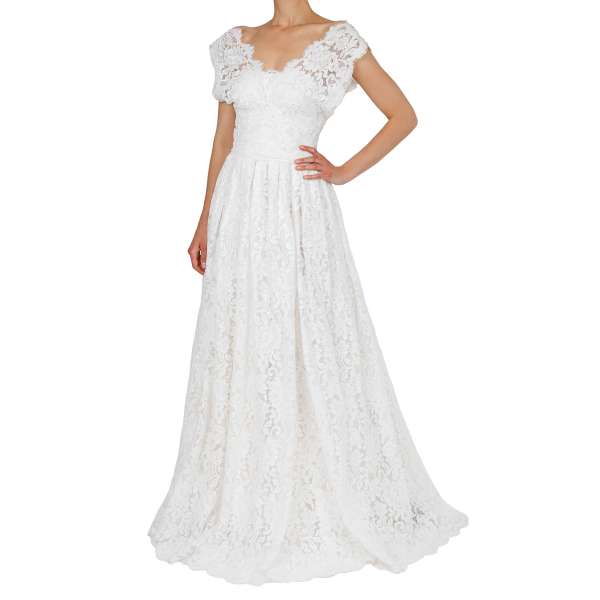 Long wedding dress with floral lace and silk corsage underdress in white by DOLCE & GABBANA