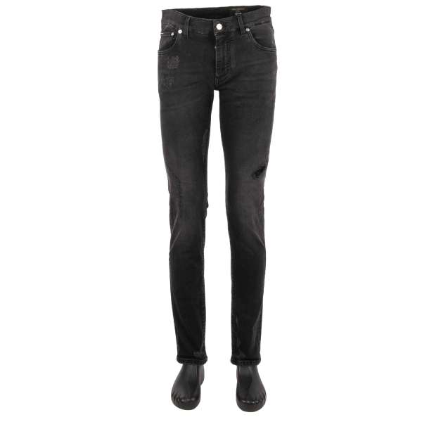 Distressed 5-pockets Jeans SKINNY with a silver metal logo plate and logo sticker by DOLCE & GABBANA