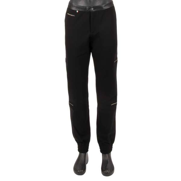 Jogging Trousers with faux leather and zip elements and Plein metal logo in black by PHILIPP PLEIN 