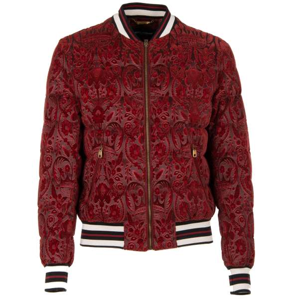 Down stuffed, brocade baroque bomber jacket with velvet crown and flowers texture, knit details and zipped pockets by DOLCE & GABBANA