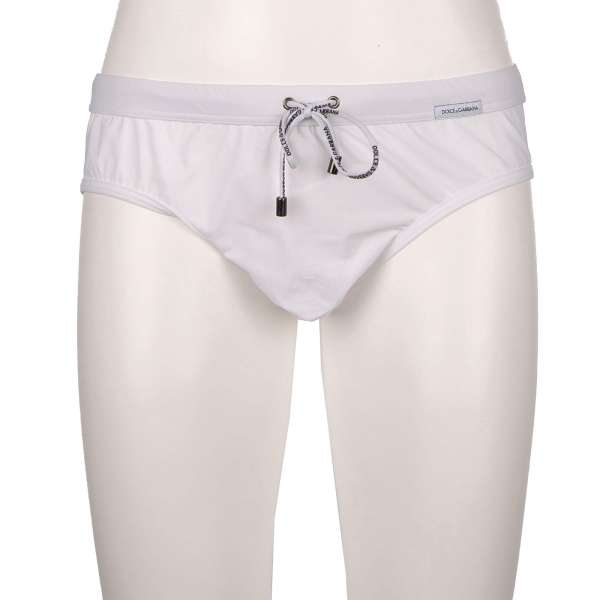 Elastic Swim / Brief trunks with logo in white by DOLCE & GABBANA Beachwear