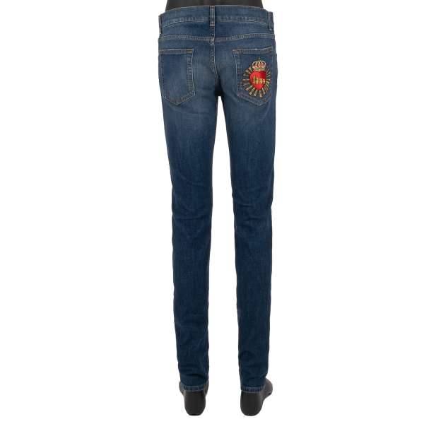 5-pockets Jeans SKINNY with a Crown Heart Italian Theme embroidered patch on the back in blue by DOLCE & GABBANA