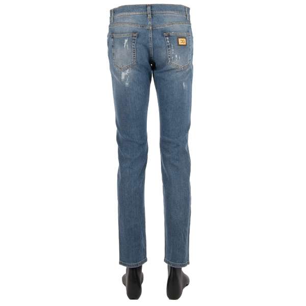 Distressed 5-pockets Jeans SLIM with a golden metal logo plate and logo sticker by DOLCE & GABBANA