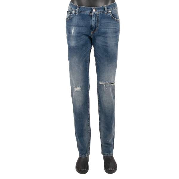 5-pockets Jeans CLASSIC with a silver metal logo plate and destroyed elements in blue by DOLCE & GABBANA