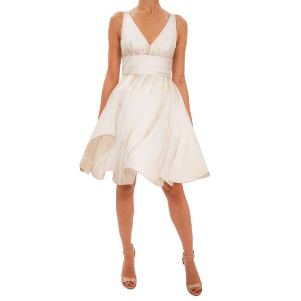 Cotton dress with Paper Doll Style and movement effect prints in beige and white by MOSCHINO COUTURE