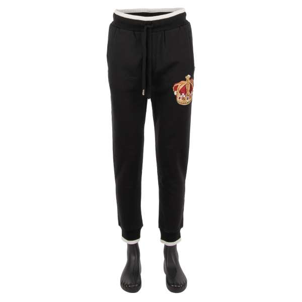 Trainingshose / Jogginghose aus Baumwolle mit bestickter Krone, DG  Logo Print, Taschen mit Reißverschluss und elastischer Taille von DOLCE & GABBANA 