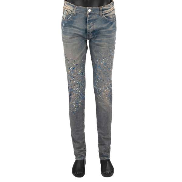 5-pockets Skinny Distressed Stretch Jeans in Indigo Clay with blue and white crystals and splatter effect painting by AMIRI