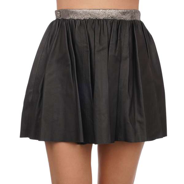 Mini leather skirt with skull, gun, dollar, heart, star print and crystal metal skull in black by PHILIPP PLEIN